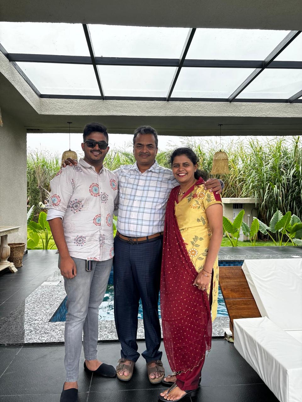 The father, mother and son who founded Trip Stories, standing together