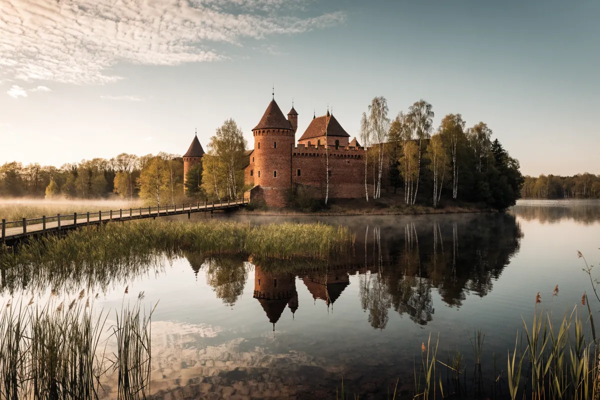 AI-generated illustration: Trakai-inspired lake castle
