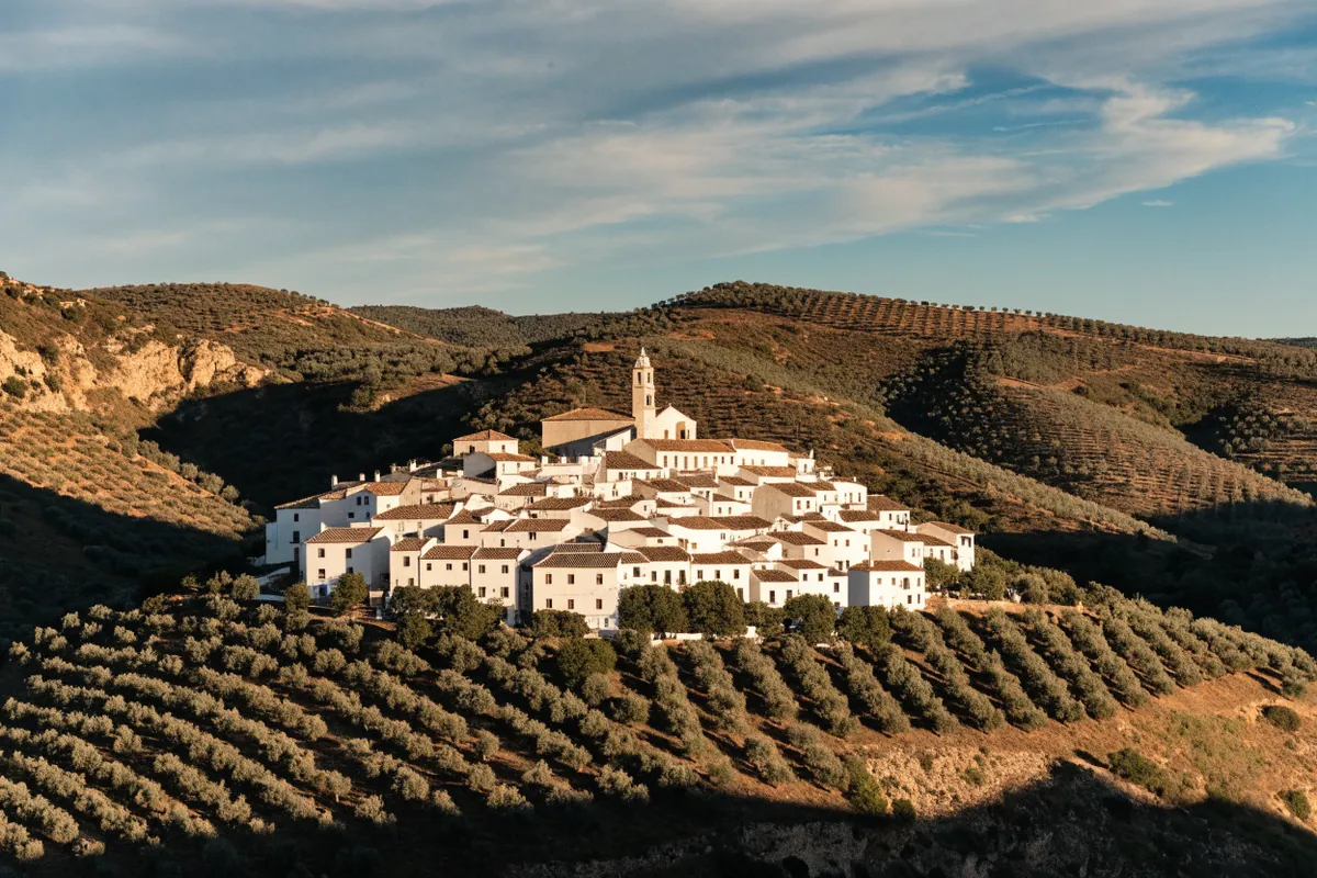 AI-generated illustration: Andalusia-inspired white village