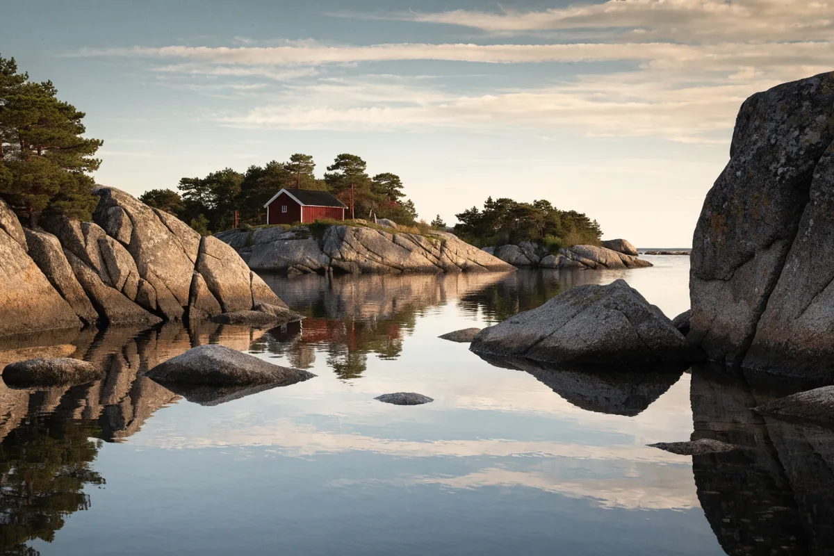 AI-generated illustration: Stockholm archipelago-inspired shore