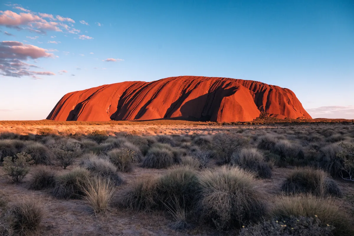AI-generated illustration: Uluru-inspired red centre